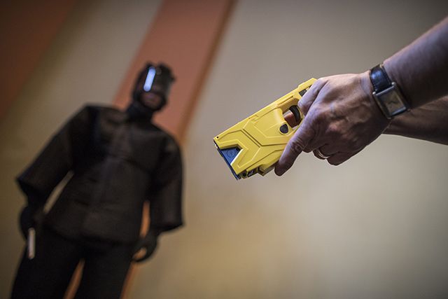 A German police officer holds a Taser gun during a press conference in Berlin, Germany, 09 February 2017.